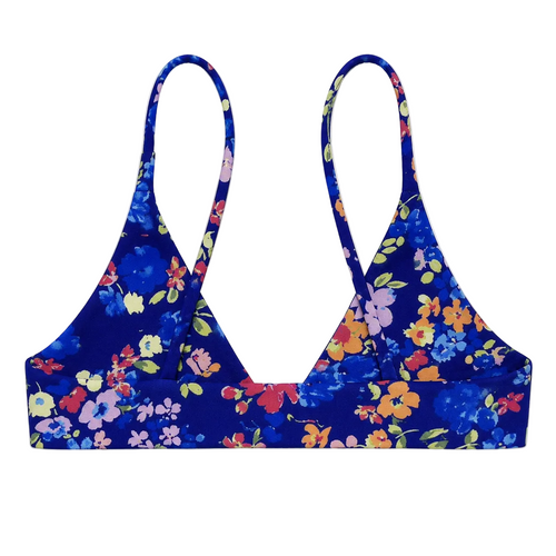 A floral print bikini top in a vibrant royal blue, featuring multicolored flowers including orange, yellow, pink, purple, and red on a clean white background.